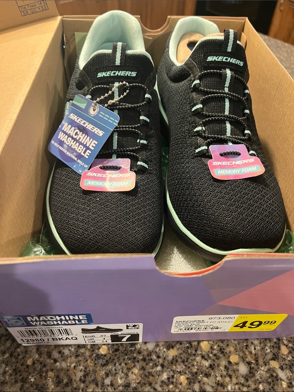 Skechers Women’s Black and Mint Slip-On Memory Foam Athletic Shoes